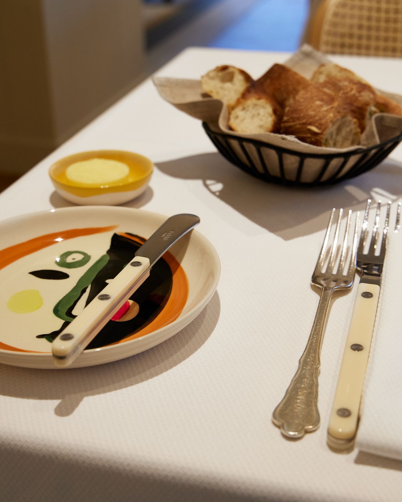 A table setting with plates and cutlery