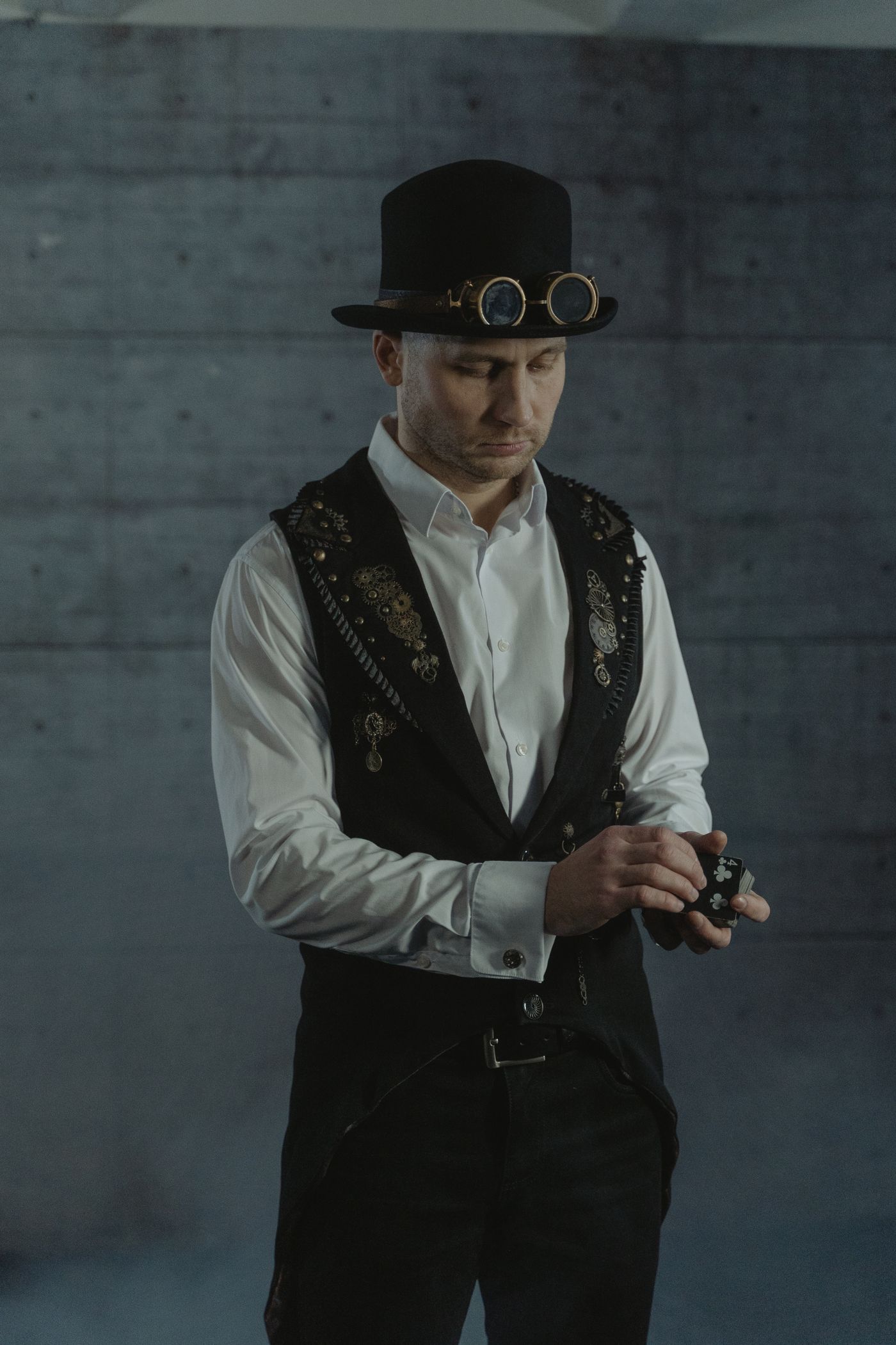 A magician performing with a deck of cards