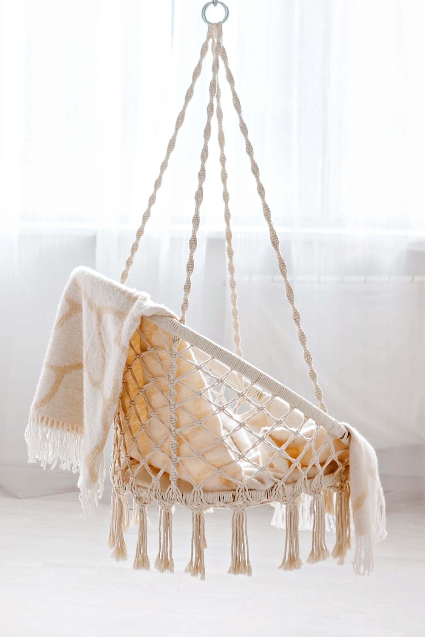 A woven swing chair
